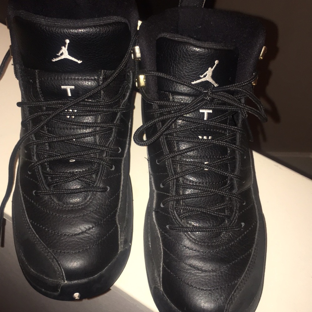 Kids black Jordan’s 12